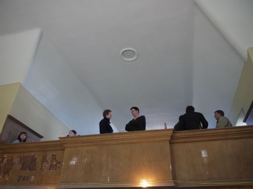 Visitors discuss the conservation work of the East Church, Cromarty